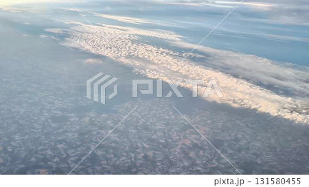 A Stunning Aerial View showcasing the Uniquely Beautiful Cloud Patterns Above the Earth 131580455