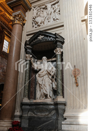 Archbasilica of Saint John Lateran Rome exterior facade and grand baroque interior with golden coffered ceiling vast nave marble statues side chapels ornate altar apse and dome Catholic basilica 131581446
