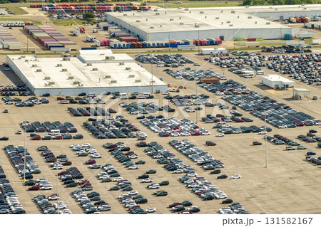 Cars parked ready for sale on automotive factory parking lot 131582167