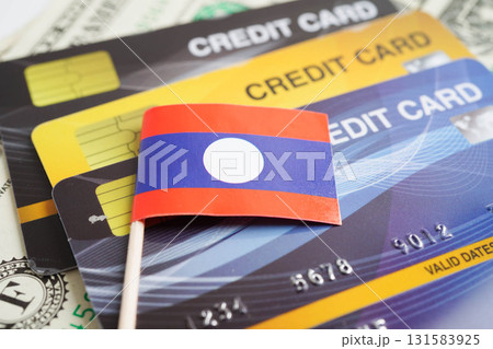 Laos flag on credit card, finance economy trading shopping online business. 131583925