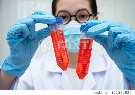 Scientist medical professional use test tube for research in science laboratory. 131583926