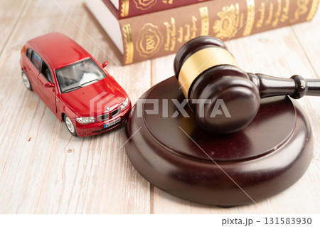 Bangkok, Thailand March 15, 2024 Car accident lawsuit and insurance, Judge hammer and money with car model. Bangkok, Thailand March 15, 2024 Car accident lawsuit and insurance, Judge hammer and money with car model. 131583930
