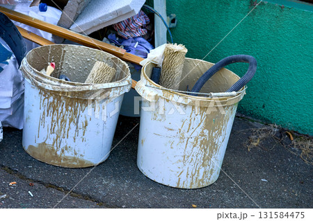 Cleaning.Construction waste,two plastic buckets with used rollers Cleaning.Construction waste,two plastic buckets with used rollers 131584475