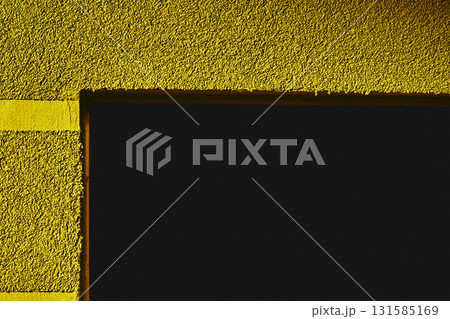Dark yellow freshly plastered wall with doorway Dark yellow freshly plastered wall with doorway 131585169