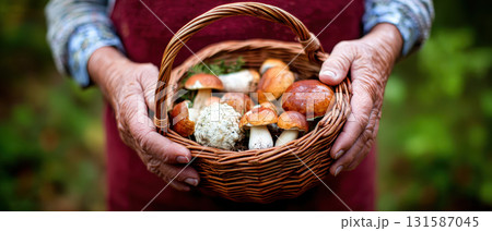 Elderly hands holding wicker basket filled with wild mushrooms in outdoor setting, symbolizing longevity, tradition, nature, and healthy lifestyle with rustic and peaceful mood Elderly hands holding wicker basket filled with wild mushrooms in outdoor setting, symbolizing longevity, tradition, nature, and healthy lifestyle with rustic and peaceful mood 131587045