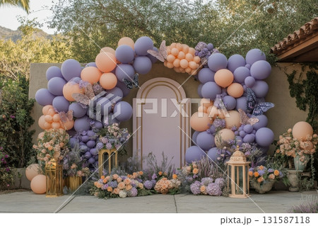 Festive outdoor balloon arch decor for elegant celebrations in serene venues 131587118
