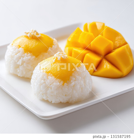Mango sticky rice sweet coconut rice fresh ripe mango traditional Thai dessert served on white plate tropical delicious summer treat Asian cuisine appetizing presentation Mango sticky rice sweet coconut rice fresh ripe mango traditional Thai dessert served on white plate tropical delicious summer treat Asian cuisine appetizing presentation 131587195