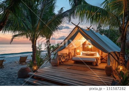 Relaxing beach glamping experience tropical paradise photography serenity sunset view luxury camping 131587282