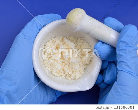 Sodium Oleate powder on light grey background. 131590301