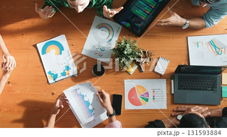 Top view of manager use tablet to analyze data and financial chart. Convocation. Top view of manager use tablet to analyze data and financial chart. Convocation. 131593884