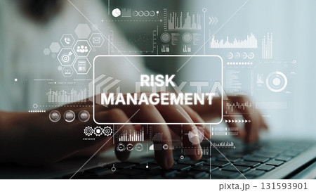 Hands Typing on Keyboard with Digital Risk Management Graphics and Data Visualizations in a Professional Setting. Asymptotic smart data analytic 131593901