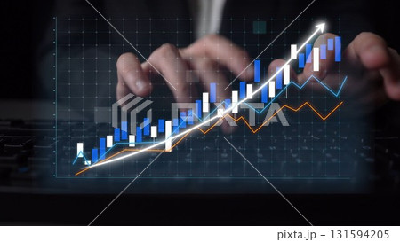 Businessman Analyzing Data Trends on a Modern Digital Graph with Hands on Keyboard in a Dark Office Setting Copula Businessman Analyzing Data Trends on a Modern Digital Graph with Hands on Keyboard in a Dark Office Setting Copula 131594205