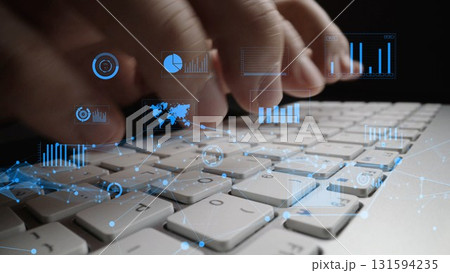 Hands Typing on Laptop Keyboard with Digital Data Visualization and Graphs, Representing Technology and Data Analysis Concepts xenic Hands Typing on Laptop Keyboard with Digital Data Visualization and Graphs, Representing Technology and Data Analysis Concepts xenic 131594235