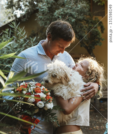 Girl Shares Excitement About Puppy with Her Father Girl Shares Excitement About Puppy with Her Father 131598149