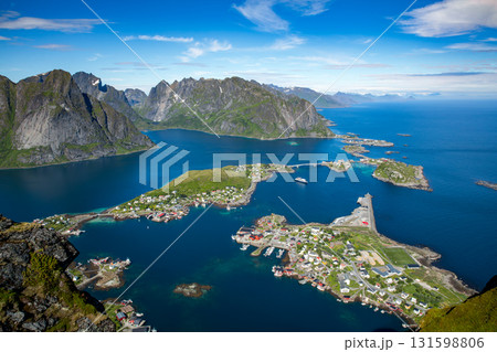 Amazing landscape of the Lofoten Islands from the top of Reinebringen Mountain with blue sky , county of Nordland, Norway. Amazing landscape of the Lofoten Islands from the top of Reinebringen Mountain with blue sky , county of Nordland, Norway. 131598806