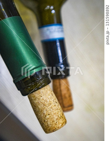 Natural cork and green glass wine bottle, craft style, Eco materials: cork and glass in winemaking, minimalism 131598892