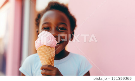 African American girl portrait enjoying pink ice cream cone, copy space African American girl portrait enjoying pink ice cream cone, copy space 131599369