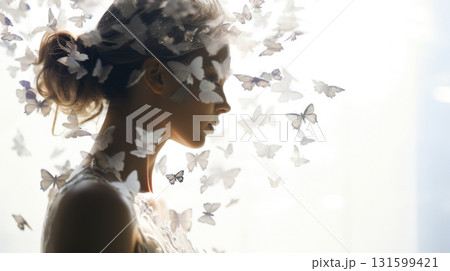 Woman profile with butterflies dispersing from head, concept of mental health 131599421