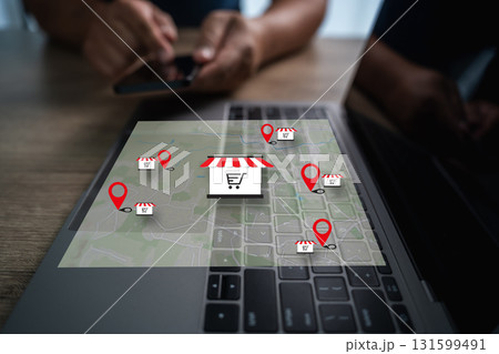Local SEO store locator map on laptop with red pins and shop icons supports nearby search gps navigation mobile shopper journey business 131599491