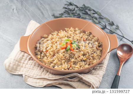 korean beef fried rice with vegetables in a bowl korean beef fried rice with vegetables in a bowl 131599727