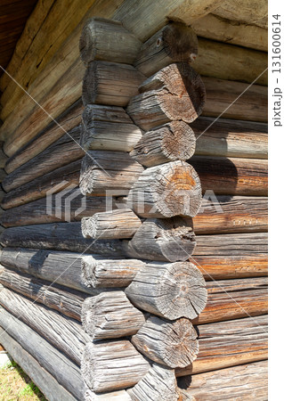 Corner of Wooden Log Cabin with Notched Joint, Close-Up 131600614
