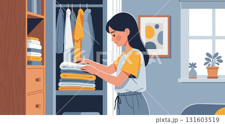 Young woman organizing clothes in closet Young woman organizing clothes in closet 131603519