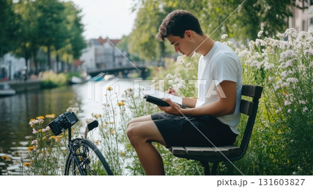 Peaceful slow travel moment surrounded by nature in a rural riverside setting. 131603827