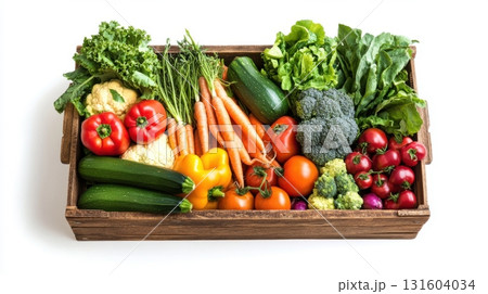 Rustic vegetable box filled with colorful farm-fresh produce isolated on white background, perfect for clean eating visuals. Rustic vegetable box filled with colorful farm-fresh produce isolated on white background, perfect for clean eating visuals. 131604034