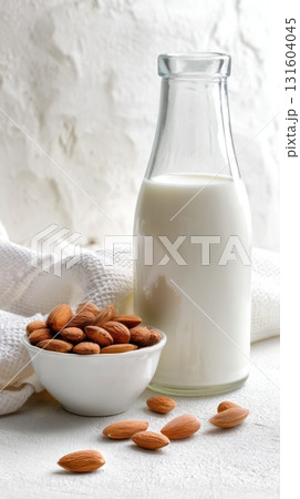 Soft minimalist food still life with plant-based milk and healthy snack ingredients. 131604045