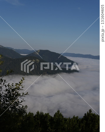 Beautiful mountain landscape, light over peaks and valleys, natural scenery, calm atmosphere and wild nature 131604605