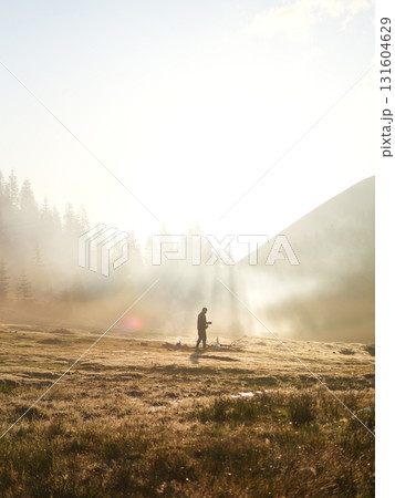 Beautiful mountain landscape, light over peaks and valleys, natural scenery, calm atmosphere and wild nature Beautiful mountain landscape, light over peaks and valleys, natural scenery, calm atmosphere and wild nature 131604629