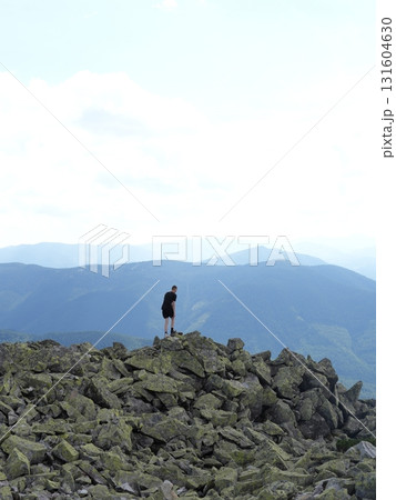 Beautiful mountain landscape, light over peaks and valleys, natural scenery, calm atmosphere and wild nature Beautiful mountain landscape, light over peaks and valleys, natural scenery, calm atmosphere and wild nature 131604630