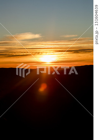 Beautiful mountain landscape, light over peaks and valleys, natural scenery, calm atmosphere and wild nature 131604639