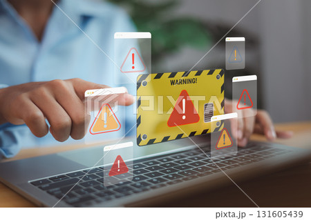 Cyber security warning alert on laptop computer, system error notification and online risk protection concept Cyber security warning alert on laptop computer, system error notification and online risk protection concept 131605439