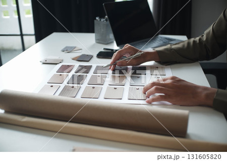 Architecture and Interior Designer man choosing interior materials. 131605820