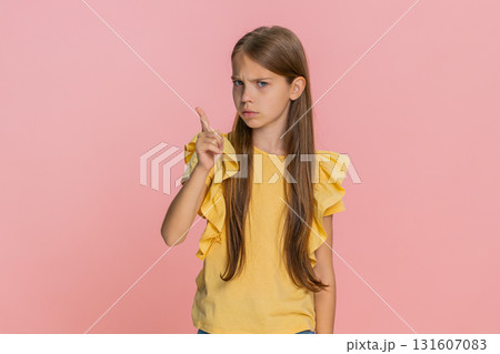 Child girl kid shaking head showing hand gesture no, expressing refusal or disapproval emotionally 131607083