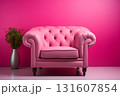 Pink retro armchair on a pink background. 131607854