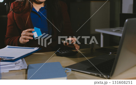 Customer signing a real estate contract in real estate agency. Customer signing a real estate contract in real estate agency. 131608251
