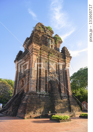 Ancient sacred Cham Tower of 12 century overgrown with grass and small trees in Tuy Hoa, Vietnam 131608717