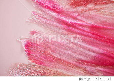 Vibrant pink and gold glitter brushstrokes on soft pink background Vibrant pink and gold glitter brushstrokes on soft pink background 131608851