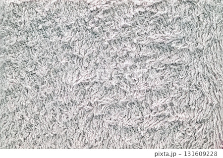 A white towel with a fuzzy texture A white towel with a fuzzy texture 131609228