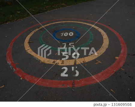 a child game on the asphalt with numbers.jumping. a child game on the asphalt with numbers.jumping. 131609508
