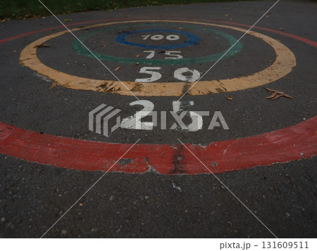 a child game on the asphalt with numbers.jumping. a child game on the asphalt with numbers.jumping. 131609511