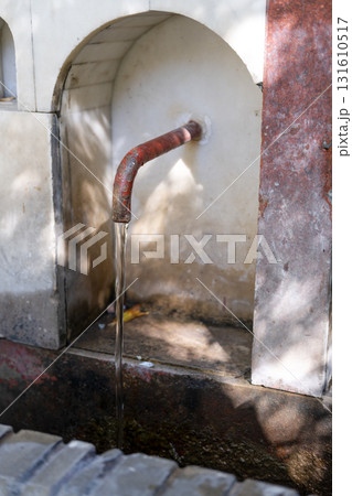 Musliman drinking well with clean water Musliman drinking well with clean water 131610517