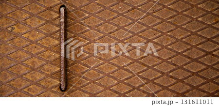 Rusty metal plate surface, rusty brown patterned metal texture background 131611011