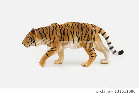 plastic toy tiger figure on a white background 131611096