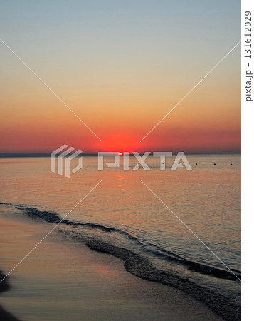 Beach Sunset with Gentle Wave Trail 131612029