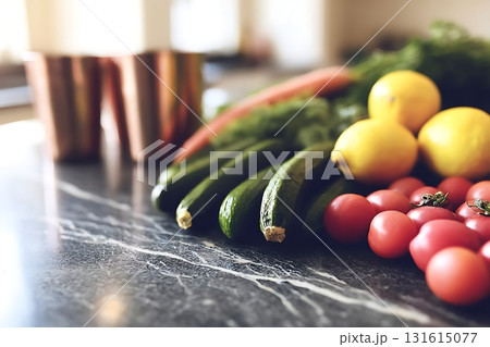 Fresh Vegetables and Fruits on a Marble Countertop with Copper Cups in the Background 131615077