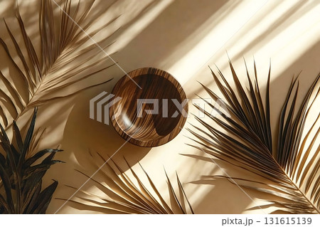 Elegant wooden bowl surrounded by tropical palm leaves in soft sunlight Elegant wooden bowl surrounded by tropical palm leaves in soft sunlight 131615139