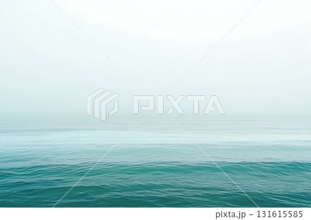 Tranquil Serene Waters Under a Soft Misty Sky with Gentle Waves and Calm Atmosphere 131615585
